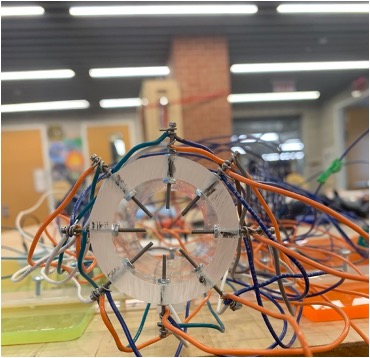 The eight-electrode EIT sensing ring wired up on the bench