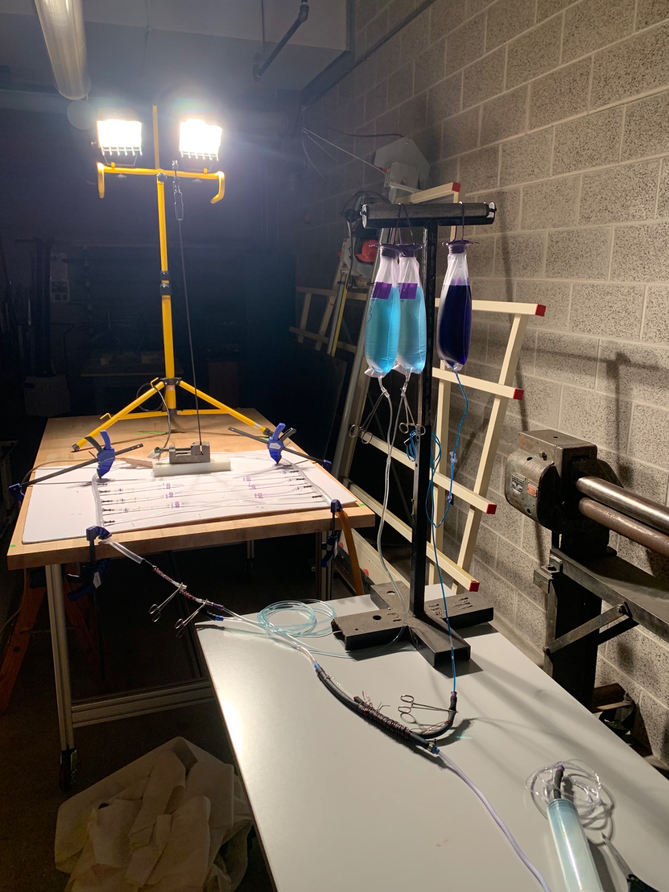 Finished catheter and sensor assemblies laid out on the bench